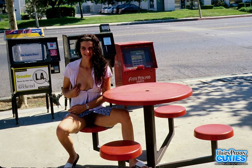 Smoking hot chick sits on a red and black c - XXX Dessert - Picture 8
