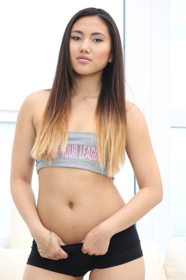 Stunning brunette wearing grey cropped top and black boxers enjoys a nice little cock ride on couple of guys on a white couch - XXXonXXX - Pic 1