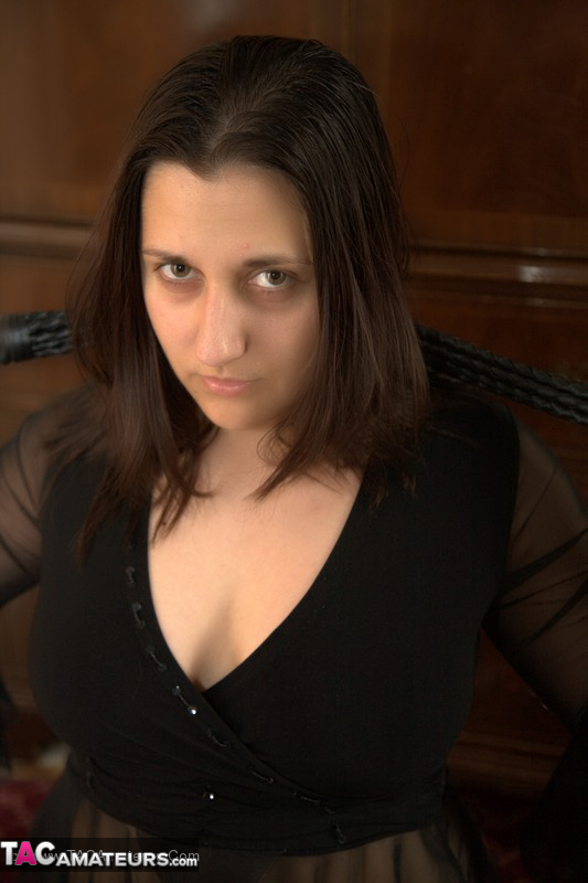 Hot MILF displays her chubby body in different poses wearing her black lingerie, stockings and orange and clear high heels in different parts of the house. - XXXonXXX - Pic 10