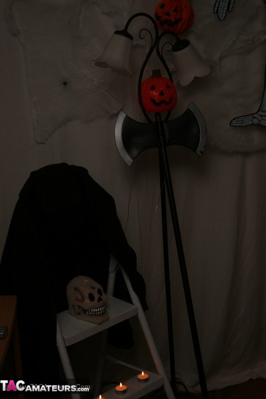 Hot granny takes off her black jacket and teases with her monster tits and chubby body in red and black lingerie, black skirt, stockings and red boots. - XXXonXXX - Pic 1