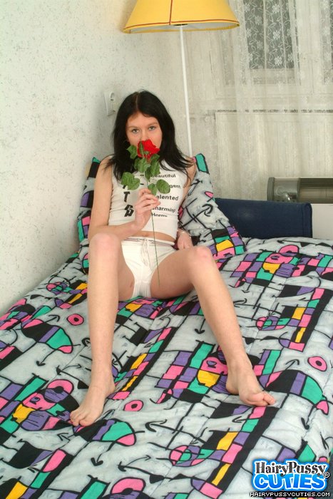 Black haired chick with rose taking off whi - XXX Dessert - Picture 1