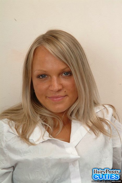 Blonde gf in white shirt and black underwear undressing on the couch and showing her hairy fuck hole - XXXonXXX - Pic 1