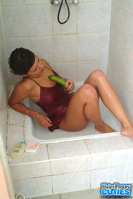 Short haired brunette in red peignoir toying her hairy pussy with cucumber in the shower - XXXonXXX - Pic 5