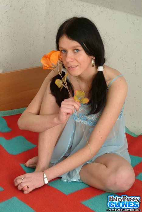 Black haired lass with blue eyes slowly taking off blue lingerie and fingering her hairy pussy on the bed - XXXonXXX - Pic 1