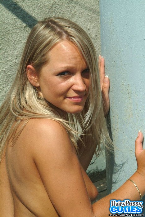 Hairy pussy blonde in black heels wiggles out of blue top and jeans miniskirt before just to pose nude outdoors - XXXonXXX - Pic 11