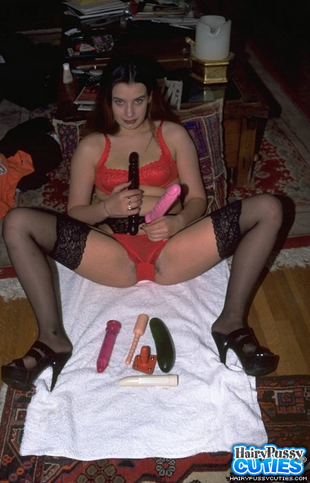 Amateur brunette in black nylons sheds red undies and toying her hairy fuck holes with cucumber and various dildos - XXXonXXX - Pic 4