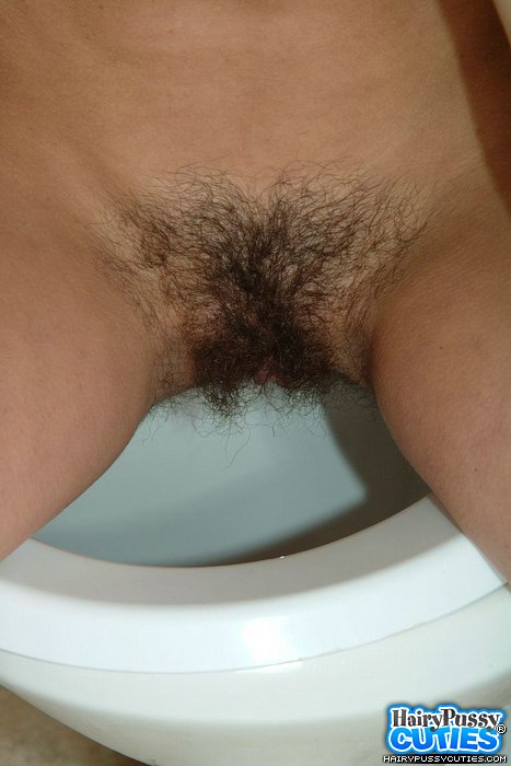 Small tits redhead took off jeans and white panty and exposing her bushy vagina while pissing in the restroom - XXXonXXX - Pic 5