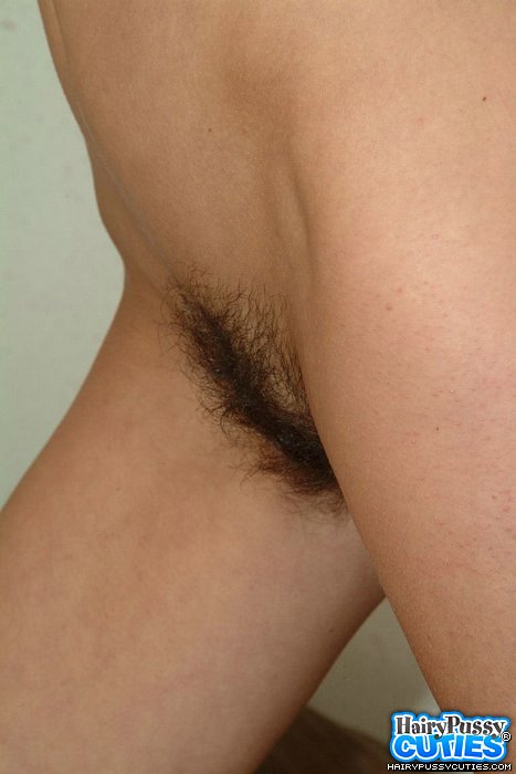 Redhead milf in jeans outfit and white underwear got nude and exposing her hairy snatch on the leather couch - XXXonXXX - Pic 5