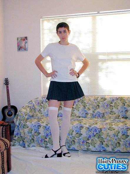 Young brunette with short hair and small boobs teasing on the couch in white hose and dark miniskirt - XXXonXXX - Pic 4