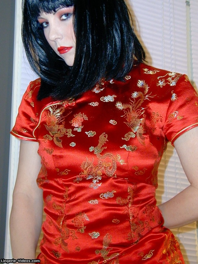 Alluring babe in red Chinese dress, gloves, panty, white stockings and red high heels pose her foxy body while she rubs her twat in different positions. - XXXonXXX - Pic 5