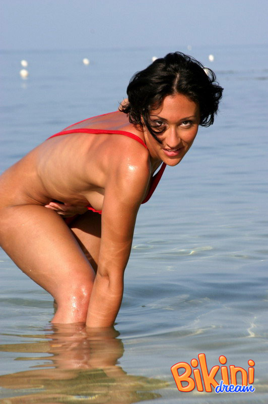 Alluring babe in red bikini gets wet at the - XXX Dessert - Picture 3