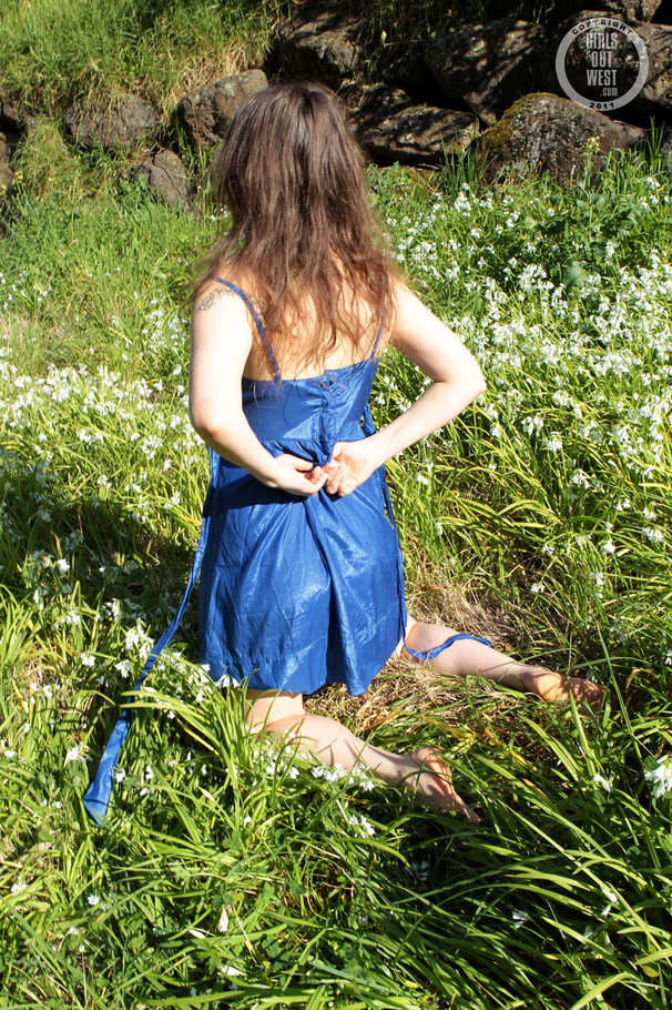 Smoking hot chick teases with her steaming hot body before she peels off her blue dress and shows her sweet boobs then pulls down her turquoise panty and reveals her indulging pussy in different poses in a flower field. - XXXonXXX - Pic 6