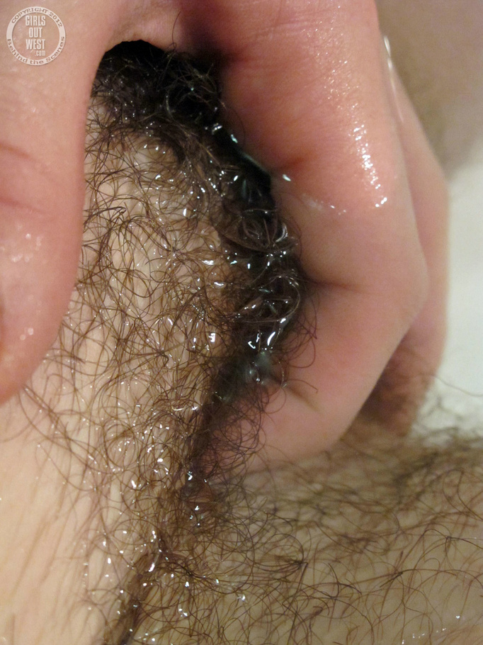 Steaming hot chick with glasses wearing black and pink underwear gets naked and shows her indulging boobs while she fingers her bushy hole as she gets her smoking hot body wet while she takes a bath in a tub. - XXXonXXX - Pic 12