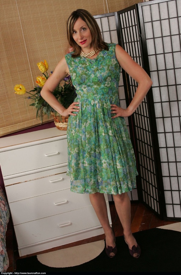 Yellow and green brunette innocently showing her tits - XXXonXXX - Pic 1