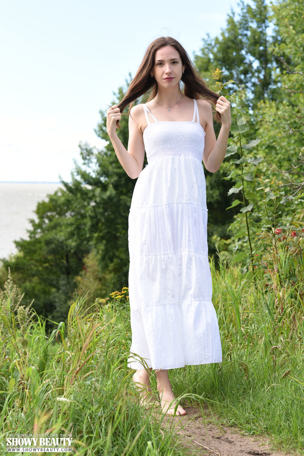 Pretty babe peels off her white dress and expose her foxy body in white underwear before she gets naked and expose her small tits and juicy pussy in different poses at the beach. - XXXonXXX - Pic 1