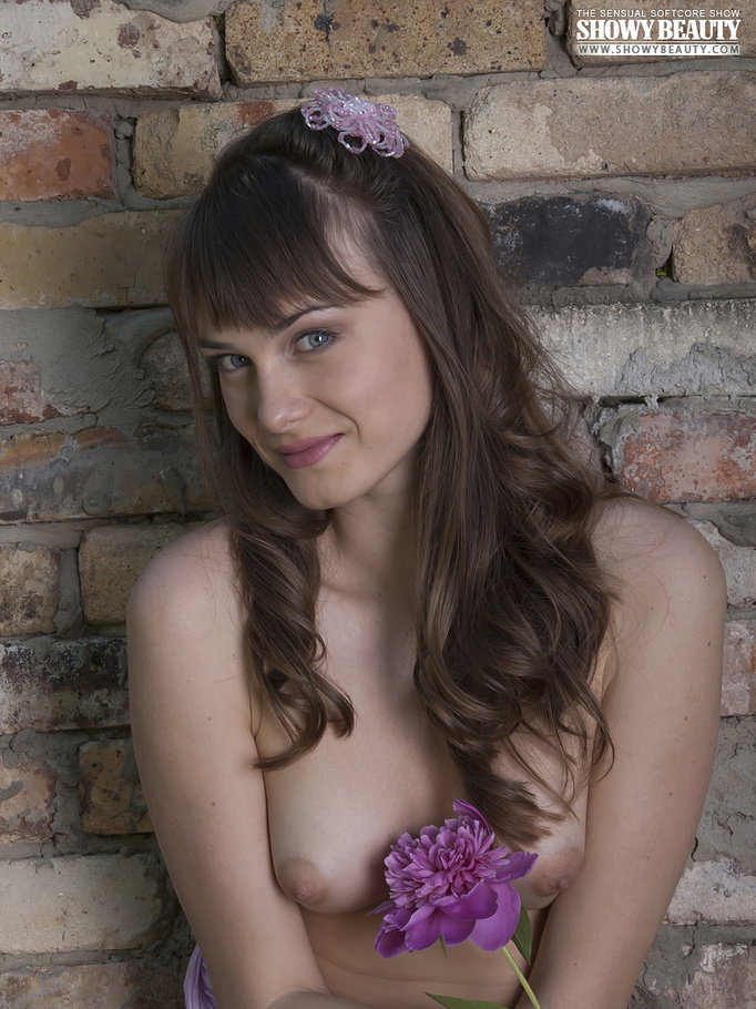 Gorgeous chick displays her skinny body in purple underwear before she peels off her bra and shows her small tits then pulls down her panty and reveals her juicy pussy in different poses in a garden of tulip. - XXXonXXX - Pic 5