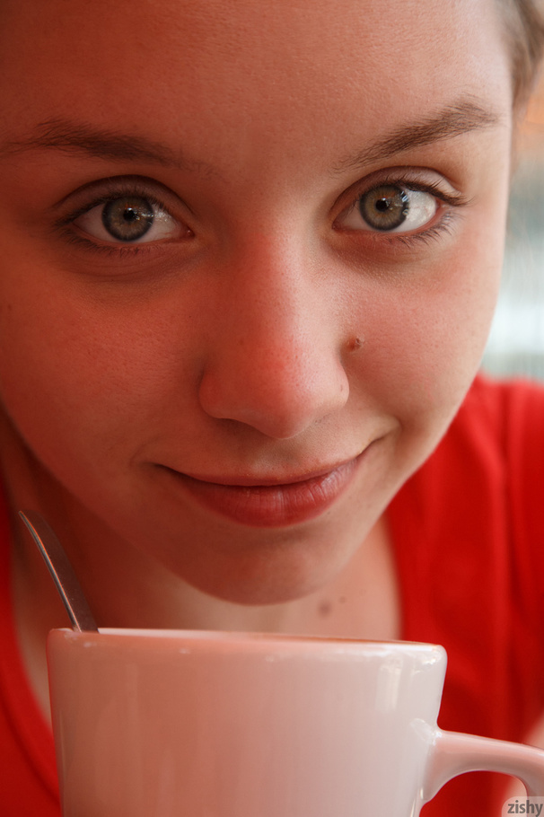 Lifting her red top, she exposes her perky  - XXX Dessert - Picture 4