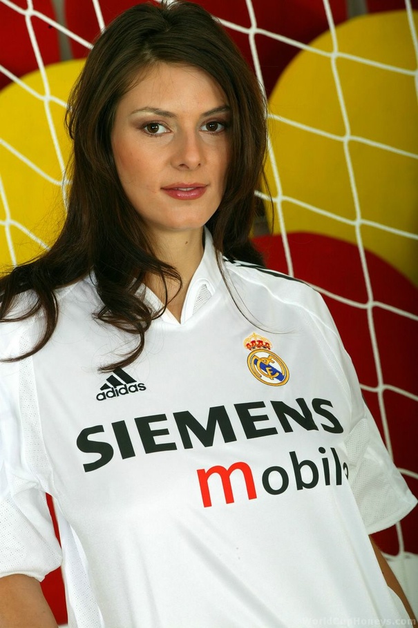Real Madrid loving brunette fingering her pussy on the pitch - XXXonXXX - Pic 1