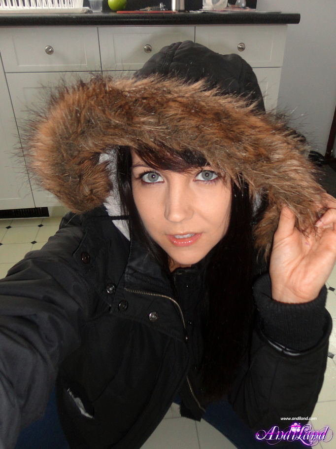 Winter jacked brunette takes off her clothes on the floor - XXXonXXX - Pic 2
