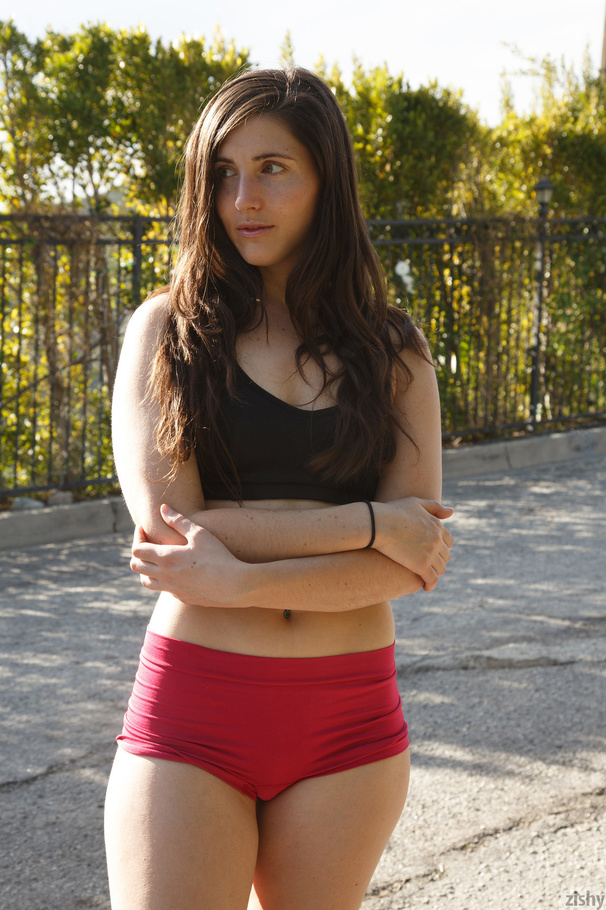 Fit brunette in red shorts gets nude outdoo - XXX Dessert - Picture 1