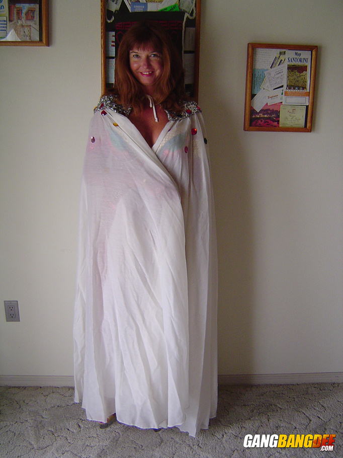 Gypsy-esque get-up brunette housewife gets naked on a chair - XXXonXXX - Pic 1