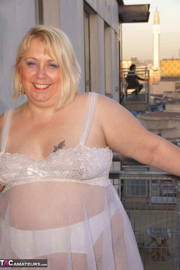 Blonde in white lingerie and peignoir blowing black dick before being twat fucked on the couch - XXXonXXX - Pic 3