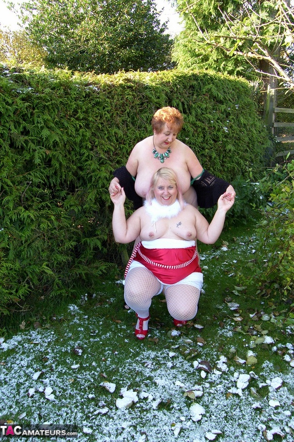 Two mature ladies in high heels and sexy lingerie undressing outdoors and posing naked on the show - XXXonXXX - Pic 4