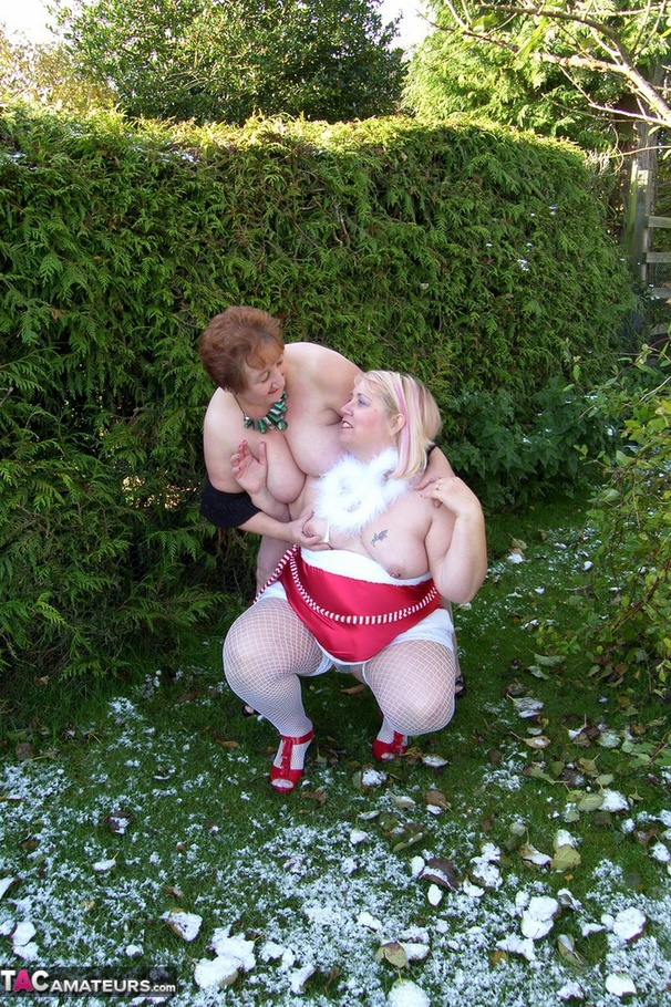 Two mature ladies in high heels and sexy lingerie undressing outdoors and posing naked on the show - XXXonXXX - Pic 6