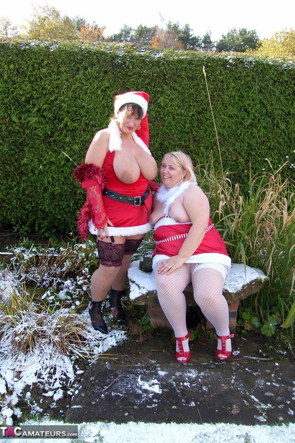 Two mature ladies in high heels and sexy lingerie undressing outdoors and posing naked on the show - XXXonXXX - Pic 19
