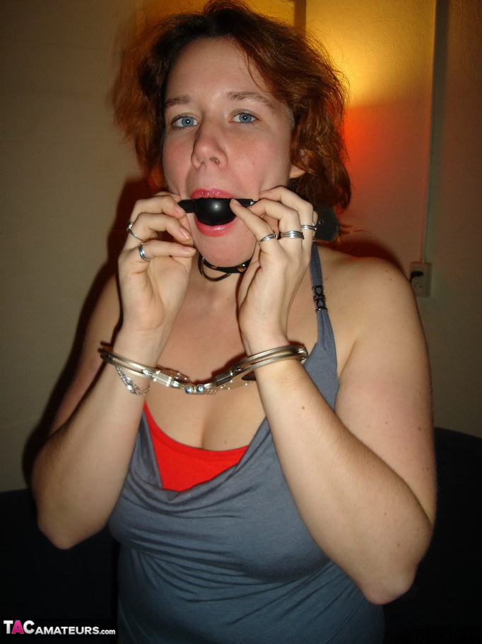 682px x 910px - Collared redhead with blue eyes wearing gag ball and ...