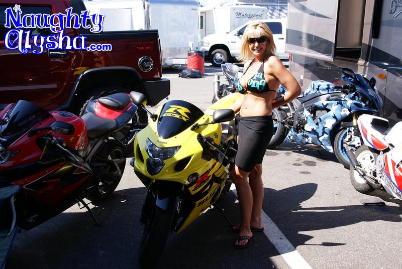 Short haired blonde wearing sexy blue bikin - XXX Dessert - Picture 1