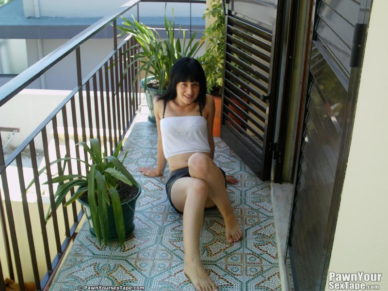 Beautiful dark haired babe poses naked on couch after stripping white tops. - XXXonXXX - Pic 10