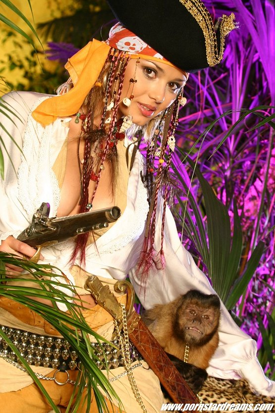 Dressed as a pirate, she strikes a pose, sh - XXX Dessert - Picture 1