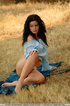 Dramatic new model has big dark hair and plump lips of a bright red color.