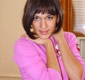 Tempting teen straddles an enormous dildo