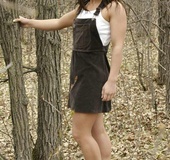 Small tits teen plays outside in the nude with leaves and trees