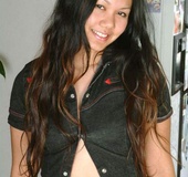 Hottie sits in cutoff jeans without panties and plays