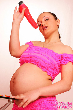 Beautiful preggo playing with a red dild - XXX Dessert - Picture 2