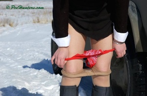 Teen peeing on snow near the car - Picture 10