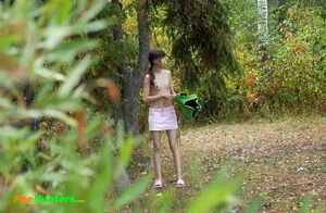 Little babe takes a leak in the nearby bushes - Picture 14