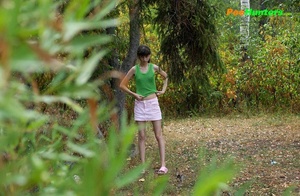 Little babe takes a leak in the nearby bushes - Picture 15