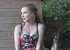 Pretty brunette Sophia Smith in sexy lingerie strips naked outdoors.