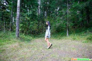 Nasty teen doing water sports in the forest glade - Picture 4