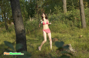 Girl goes to the woods to piss and smoke a cig - Picture 1