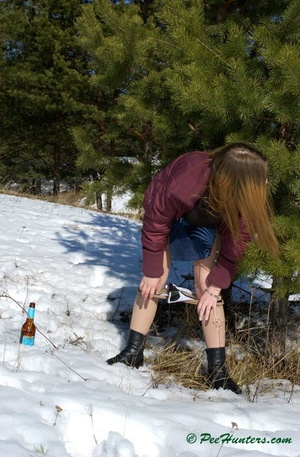 Teen peeing in the snow forest - Picture 16