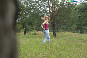 Nasty little girlie busted urinating in the bush - Picture 15
