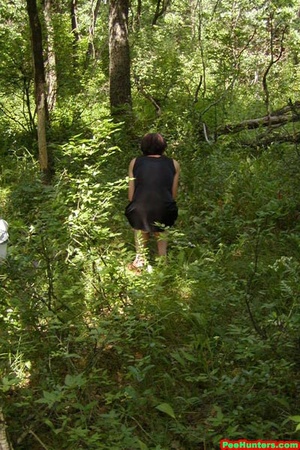 Spying on peeing in forest teen - Picture 6
