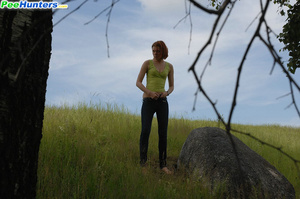 Babe tinkles on a rock in the middle of a field - Picture 12