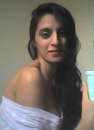 Dark haired indian babe undressing and posing in pink undies. - Picture 3