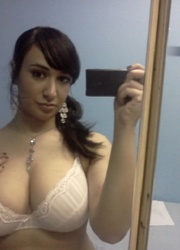 Amateur yong indian making selfshot pics of her enormous boobs.